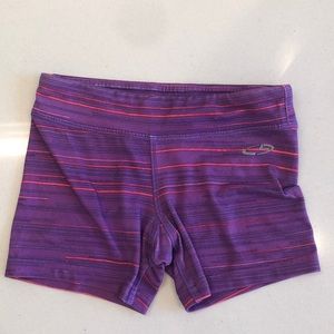 Kids ages 6-6X. Sporty biker shorts. Purple and pink stripes. Barley used.